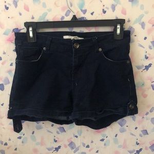 Navy blue jean shorts.